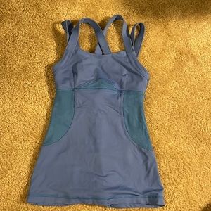 Lululemon tank with built in sports bra. Flora mesh details on sides and back